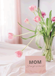 お母さんありがとうのカードと花の画像